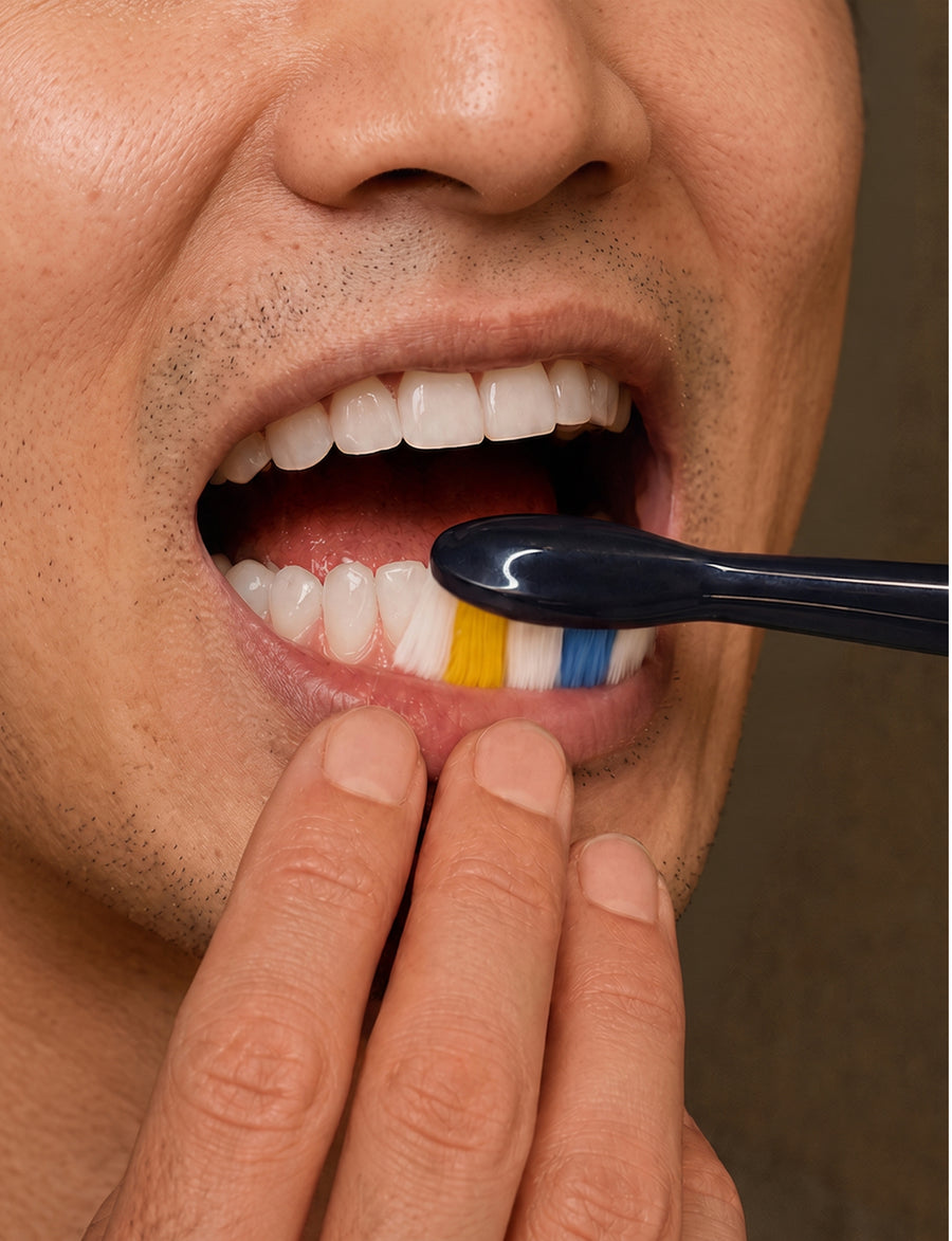 Positioning the brush head at the gumline